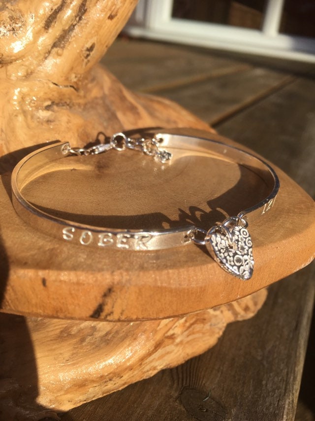 Personalised Sterling silver bracelet, fully hallmarked with choice of fine silver charm